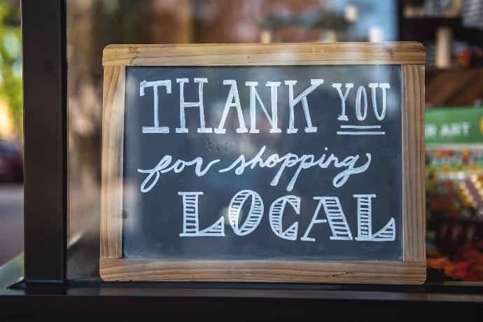 shallow focus photo of thank you for shopping signage